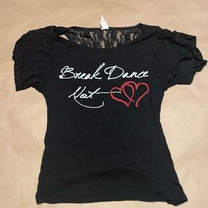 Crop top size medium with open back and cut sleeve design.